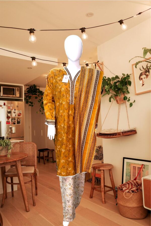 Bin Saeed Mustard Floral 3-Piece Stitched Lawn Suit – Contrast White Trousers & Striped Dupatta